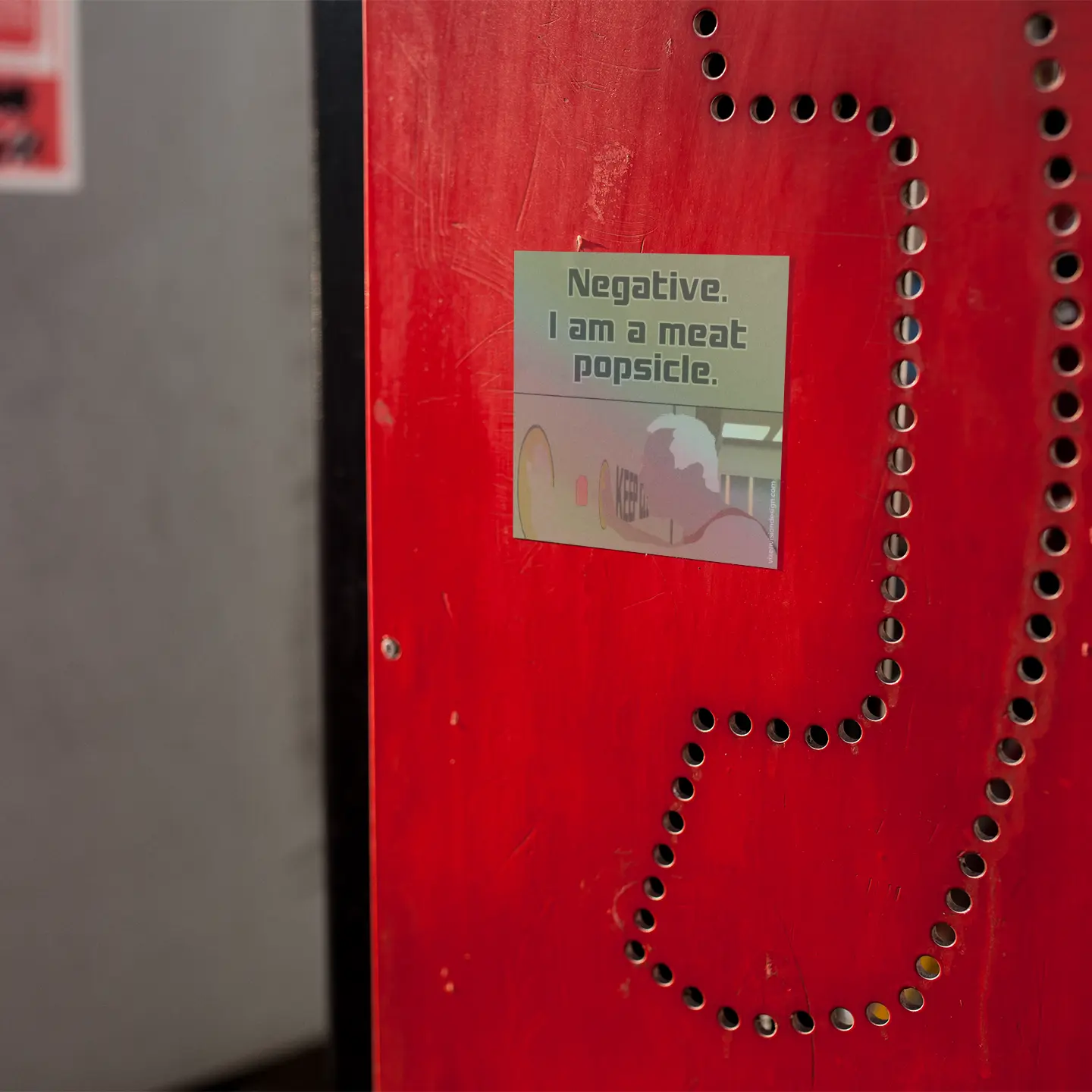 Meat Popsicle Holographic 3" Vinyl Sticker on a red phone booth