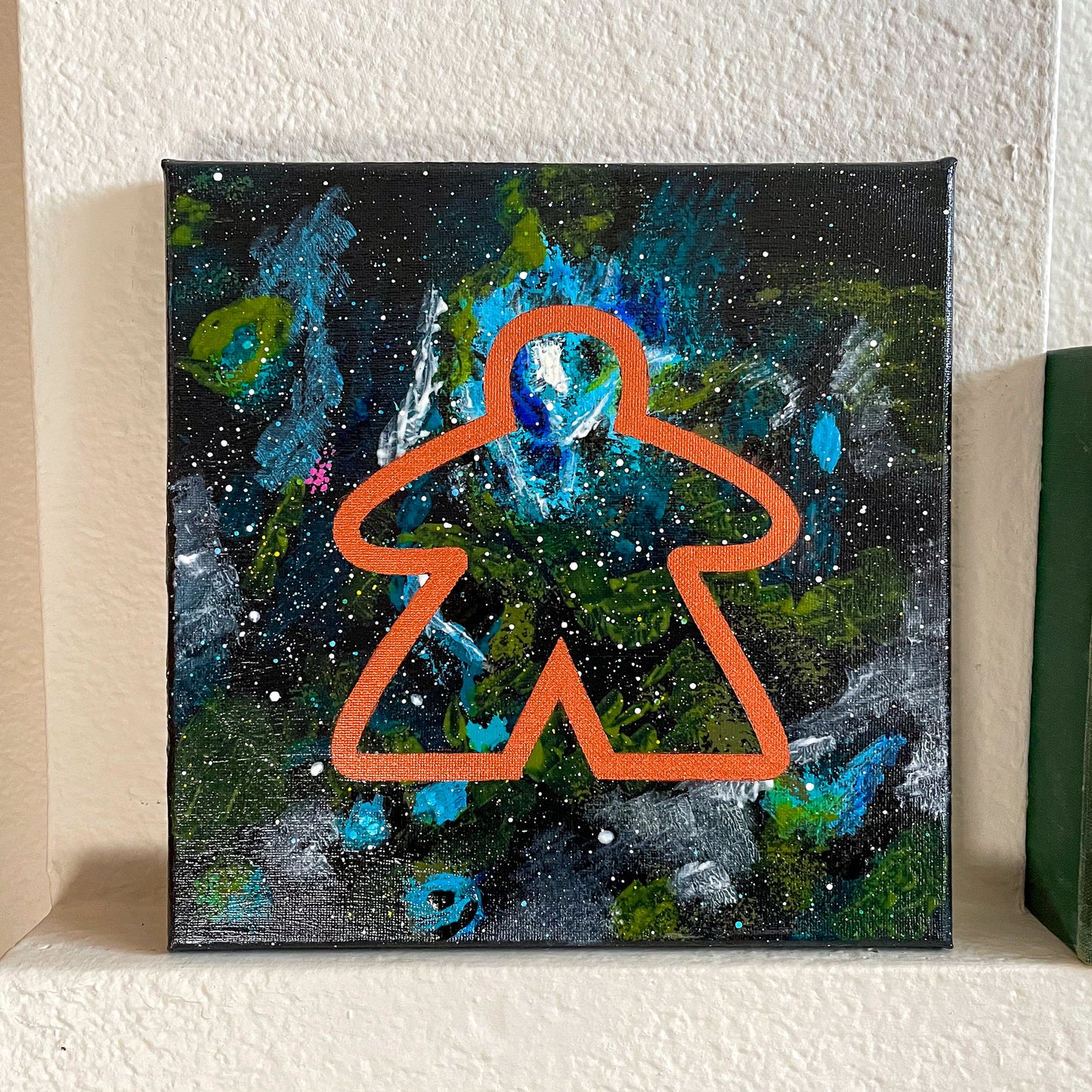 Meeple Tarantula Nebula 10x10 Geek Galaxy Painting sitting on shelf