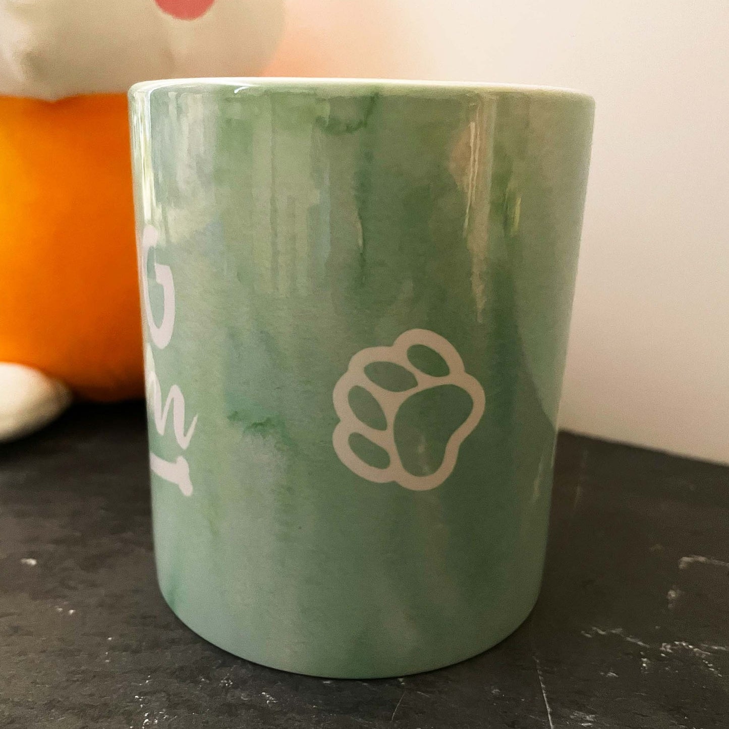 Green Watercolor Custom Dog Mom Mug showing paw on side