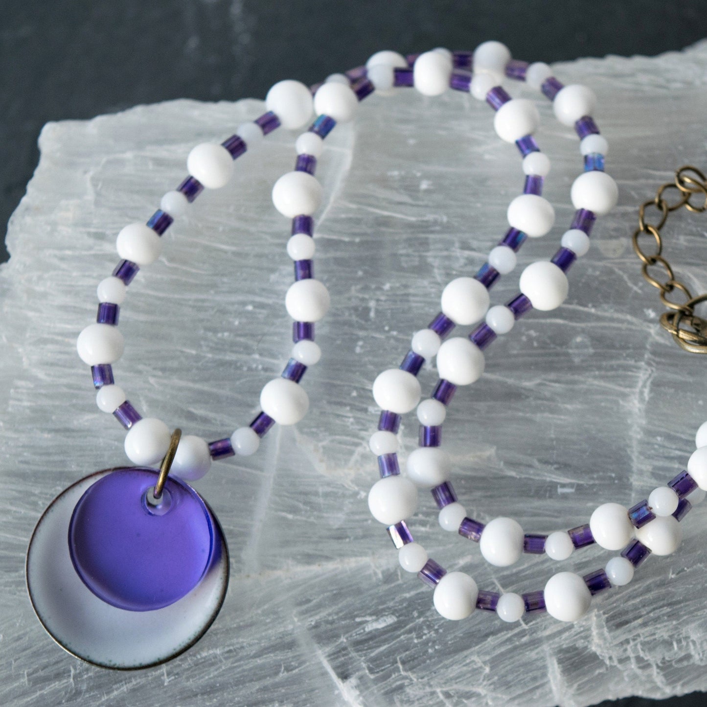 Purple and White Layered Enamel and Glass Pendant Bead Necklace on Selenite