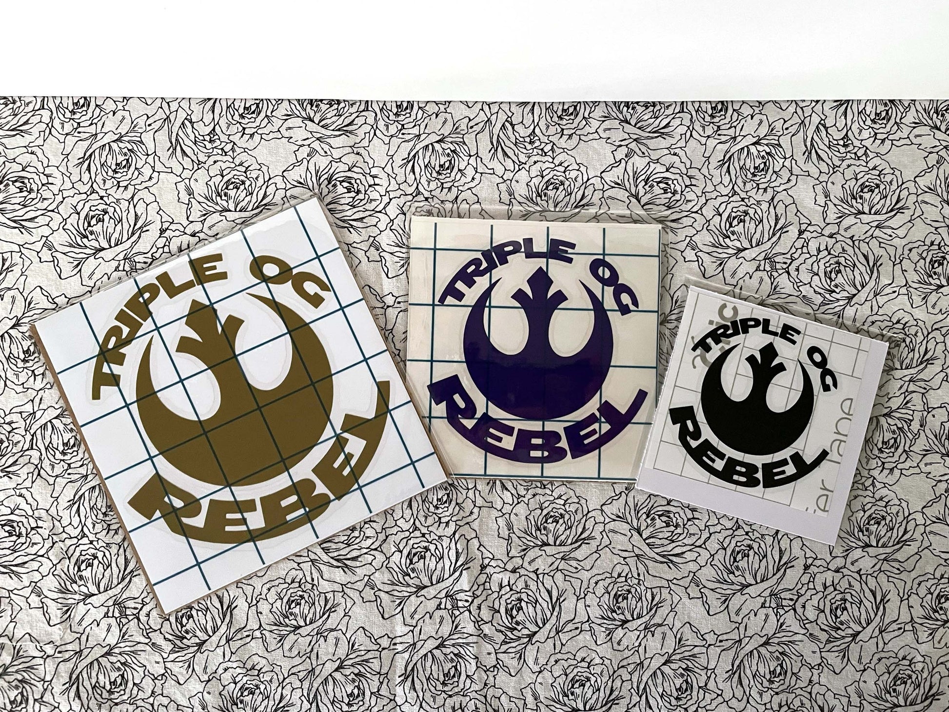 3 Triple OG Rebel Geek Vinyl Decals of varying sizes
