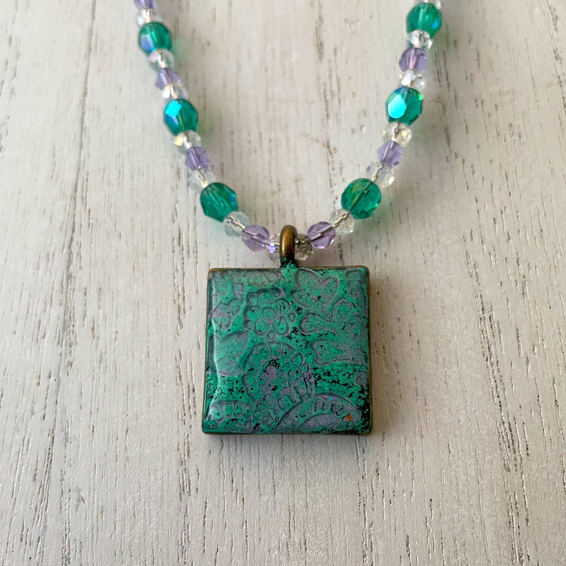 Aqua and Lavender Paisley Clay Pendant Bead Necklace close up