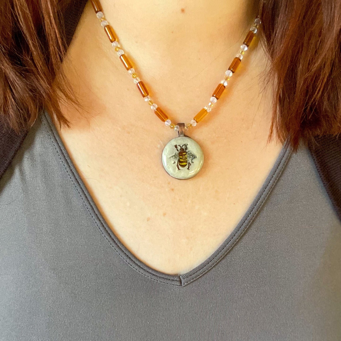 Hand Painted Bee Clay Pendant and Bead Necklace on model