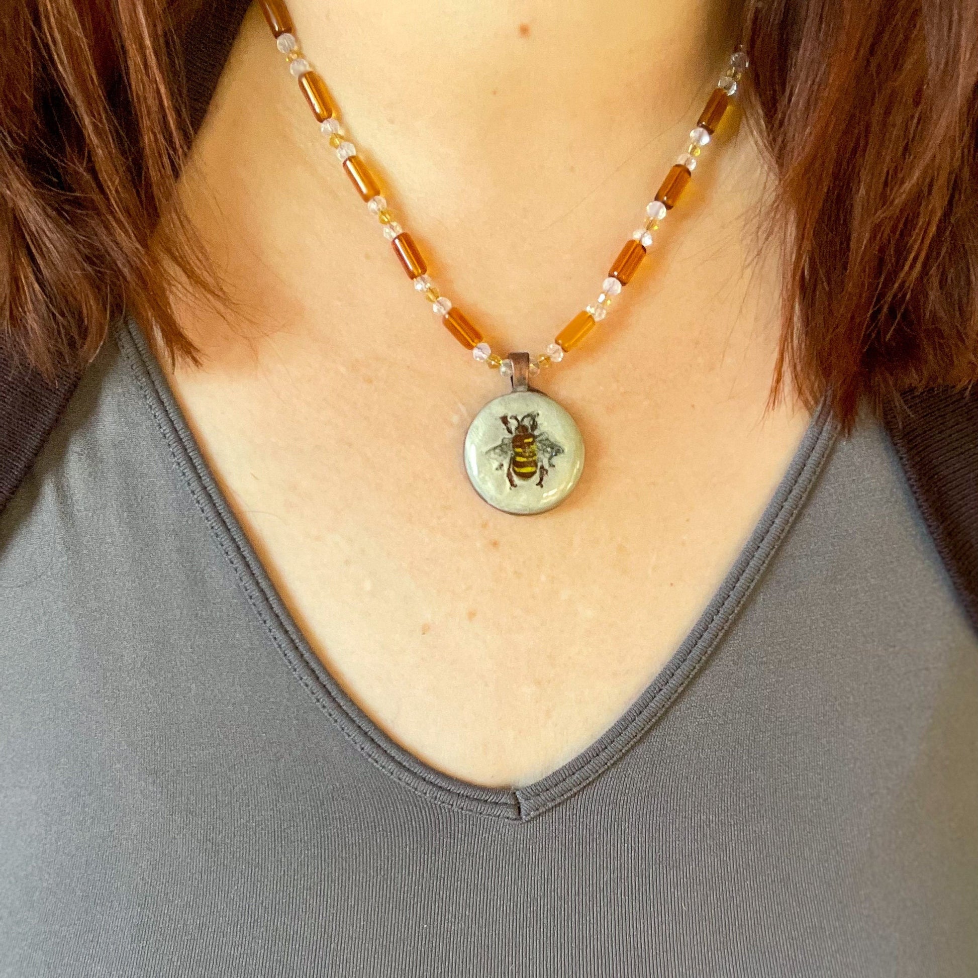 Hand Painted Bee Clay Pendant and Bead Necklace on model