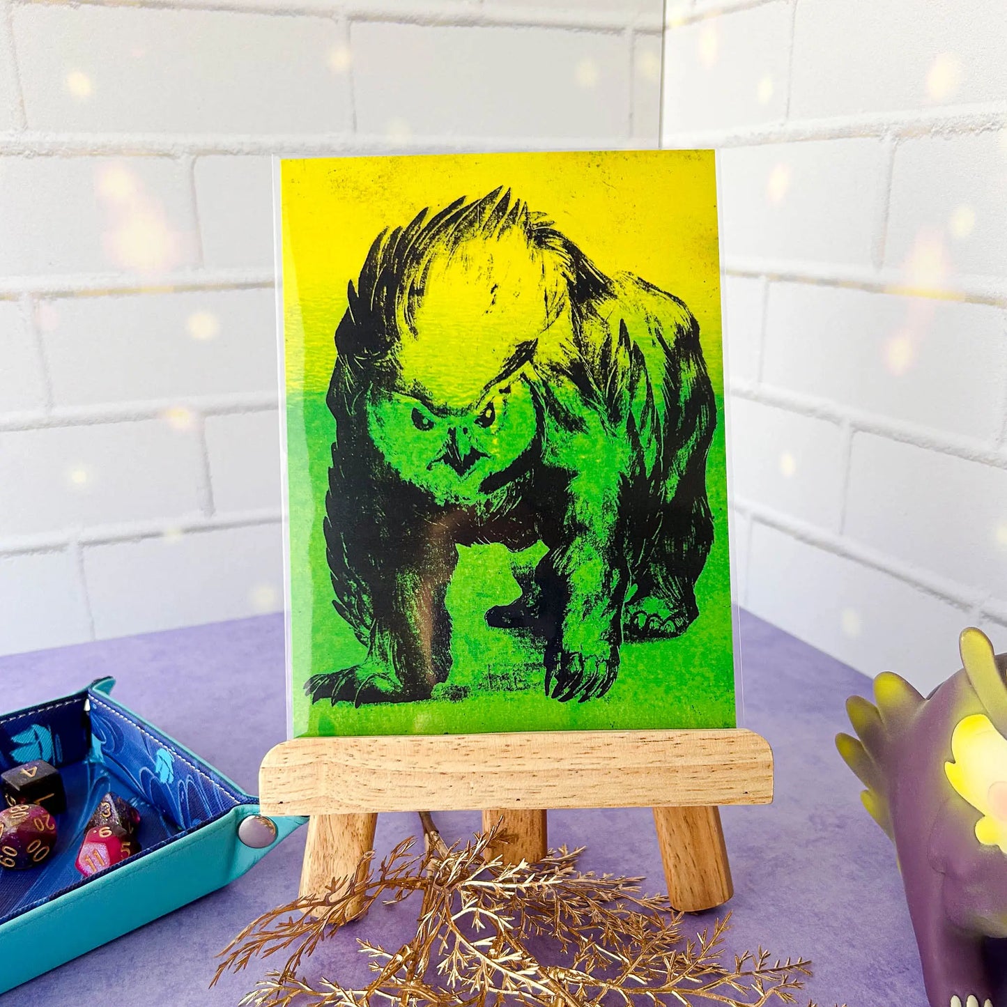 Glowing Feathered Fury 5x7 Art Card on an easel