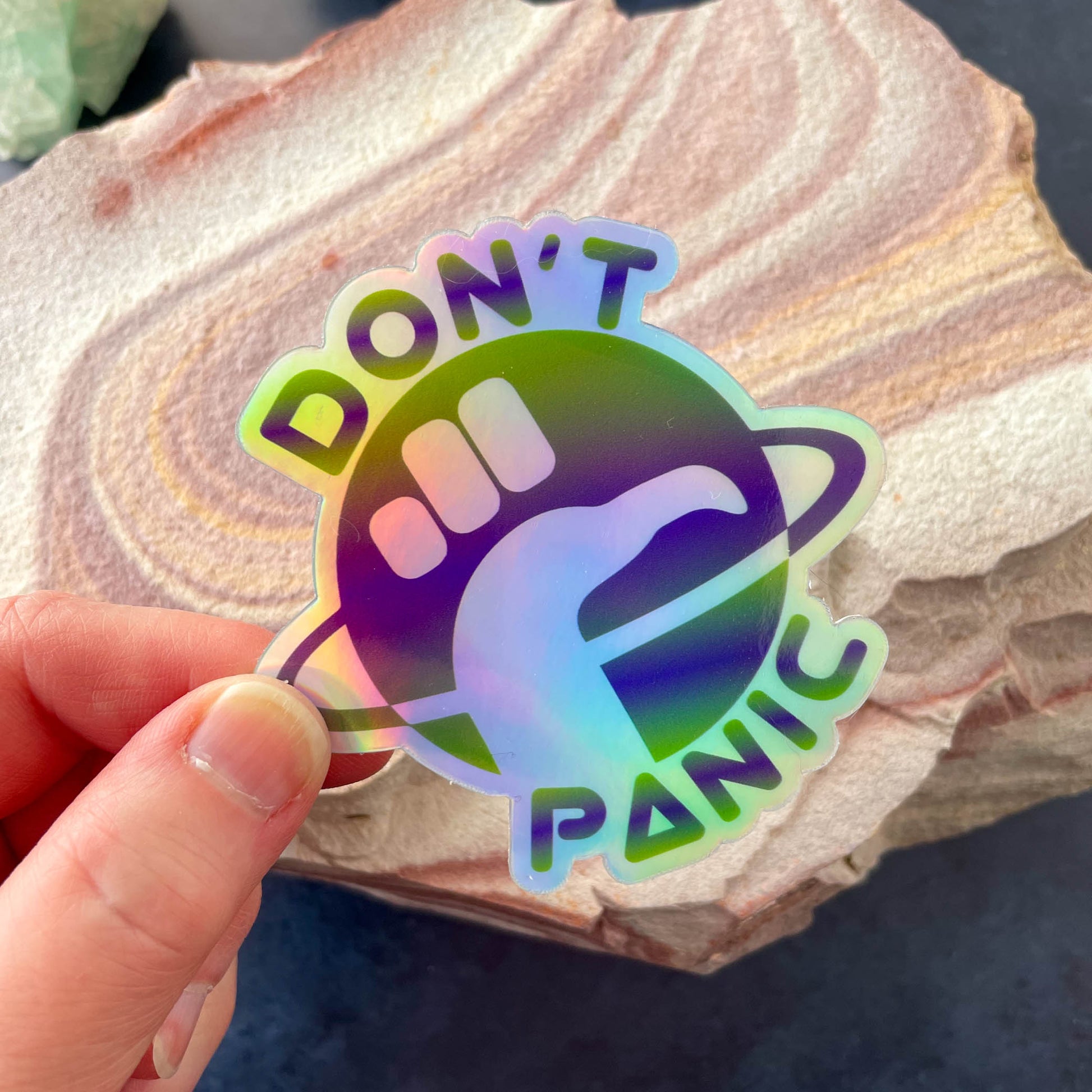 Don't Panic Holographic 3" Sticker in hand