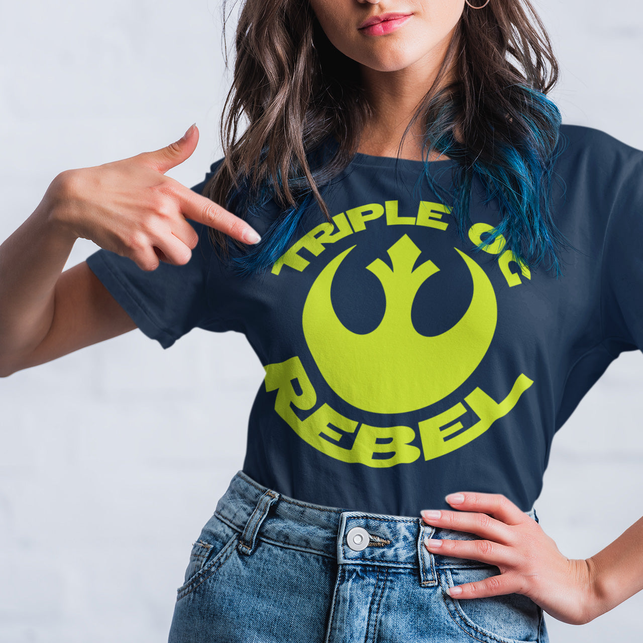 Woman pointing at her Triple OG Rebel t-shirt