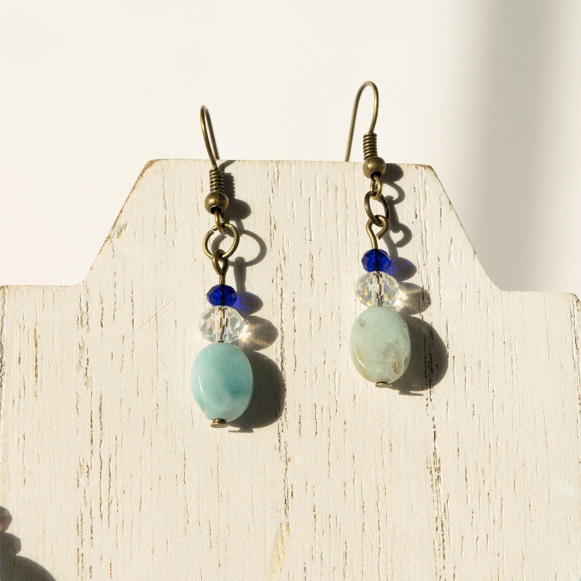 Amazonite and Clear Crystal Earrings on white wood